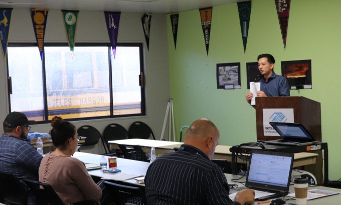 Census staff giving a training in a classroom.